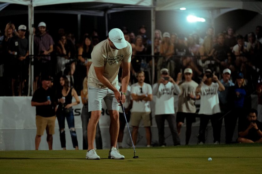 Grass League Putt With Crowd.jpg