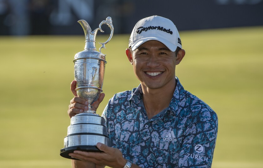 ROLEX TESTIMONEE COLLIN MORIKAWA LIFTS THE CLARET JUG TO CELEBRATE WINNING THE OPEN IN 2021.jpg