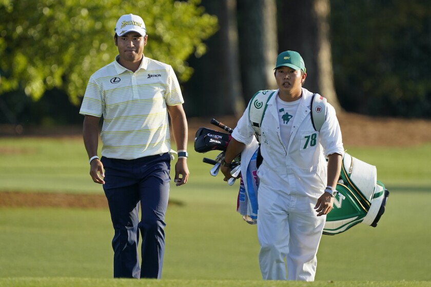 Hideki Matsuyama and caddie Shota Hayafuji at 2021 Masters