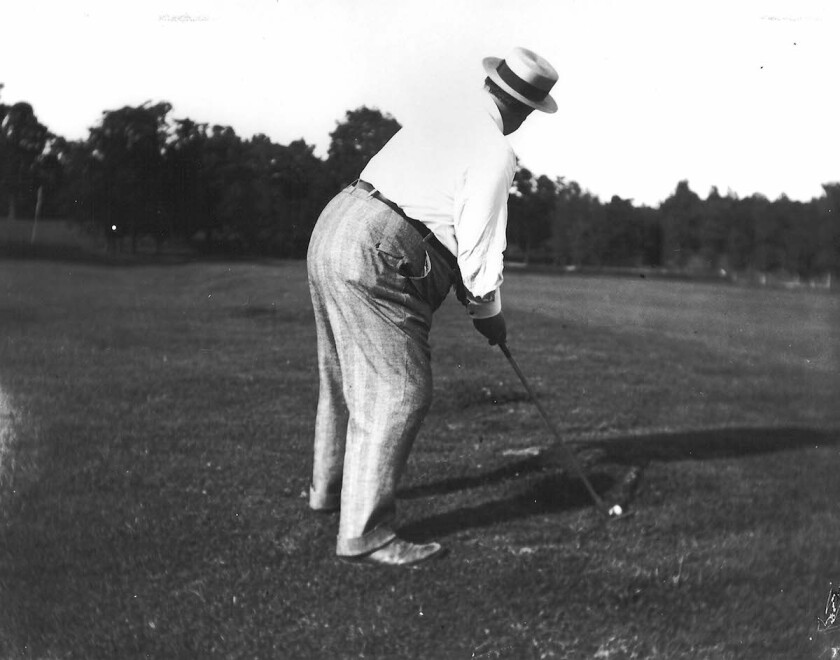 Taft.playing.golf.jpg