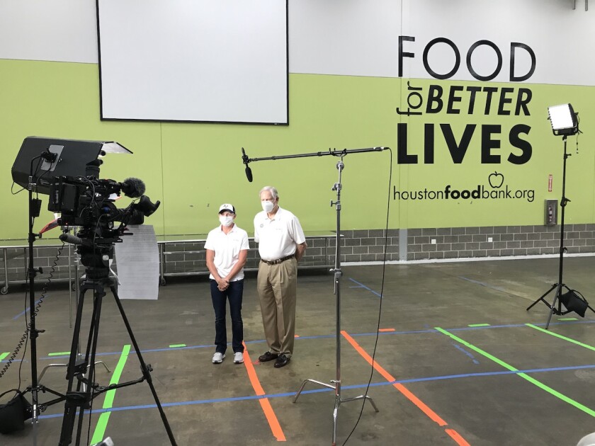 Stacy Lewis and Corby Robertson at Houston Food Bank