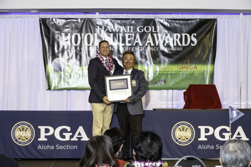 Kapalua Golf's Michael Castillo recieving award from Aloha Section.jpg