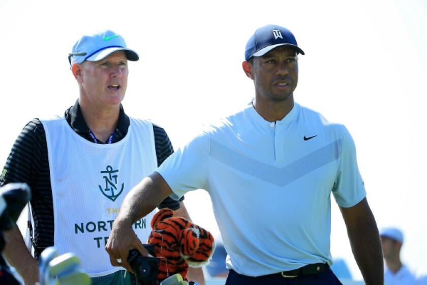Tiger Woods, with caddie Joe LaCava